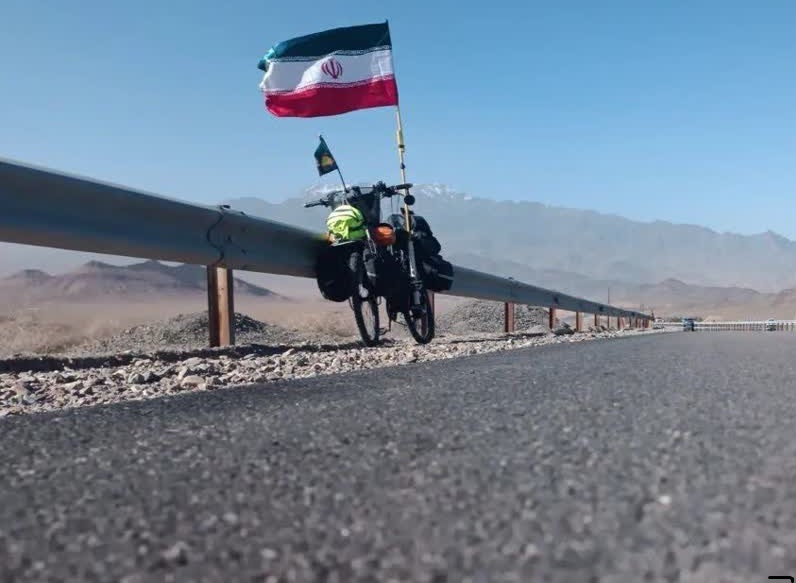 از مزار شهید تا حمایت از قهرمان وطن/روایت غیرت یک دوچرخه‌سوار کرجی